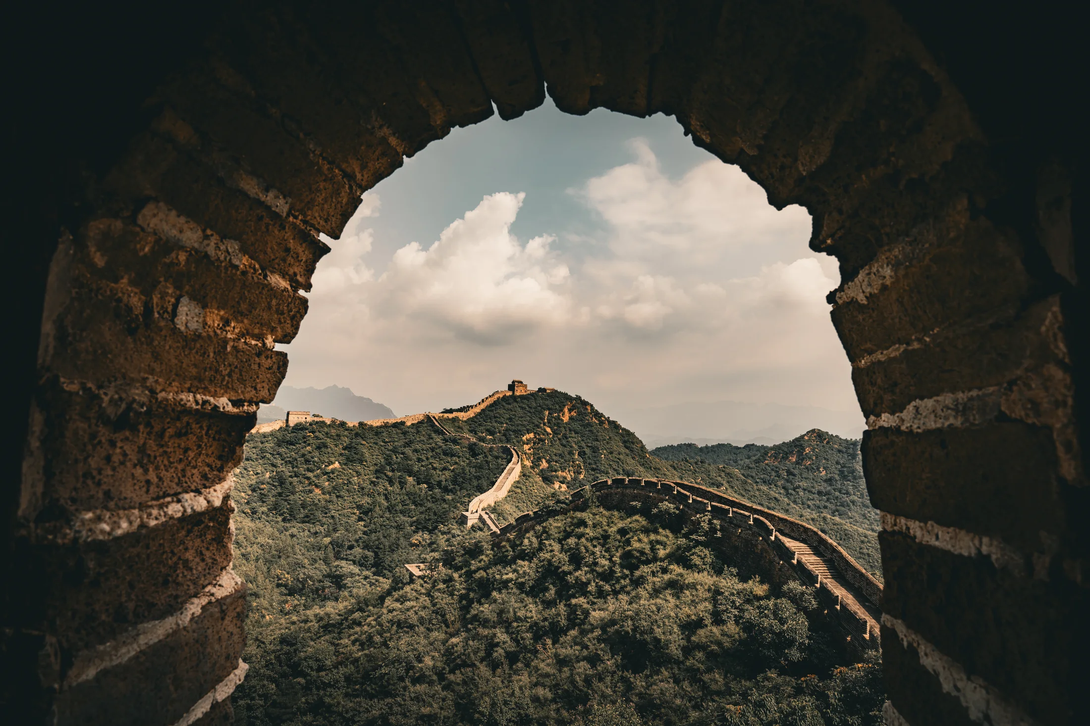 The Great Wall seen through a Jinshanling stone arch