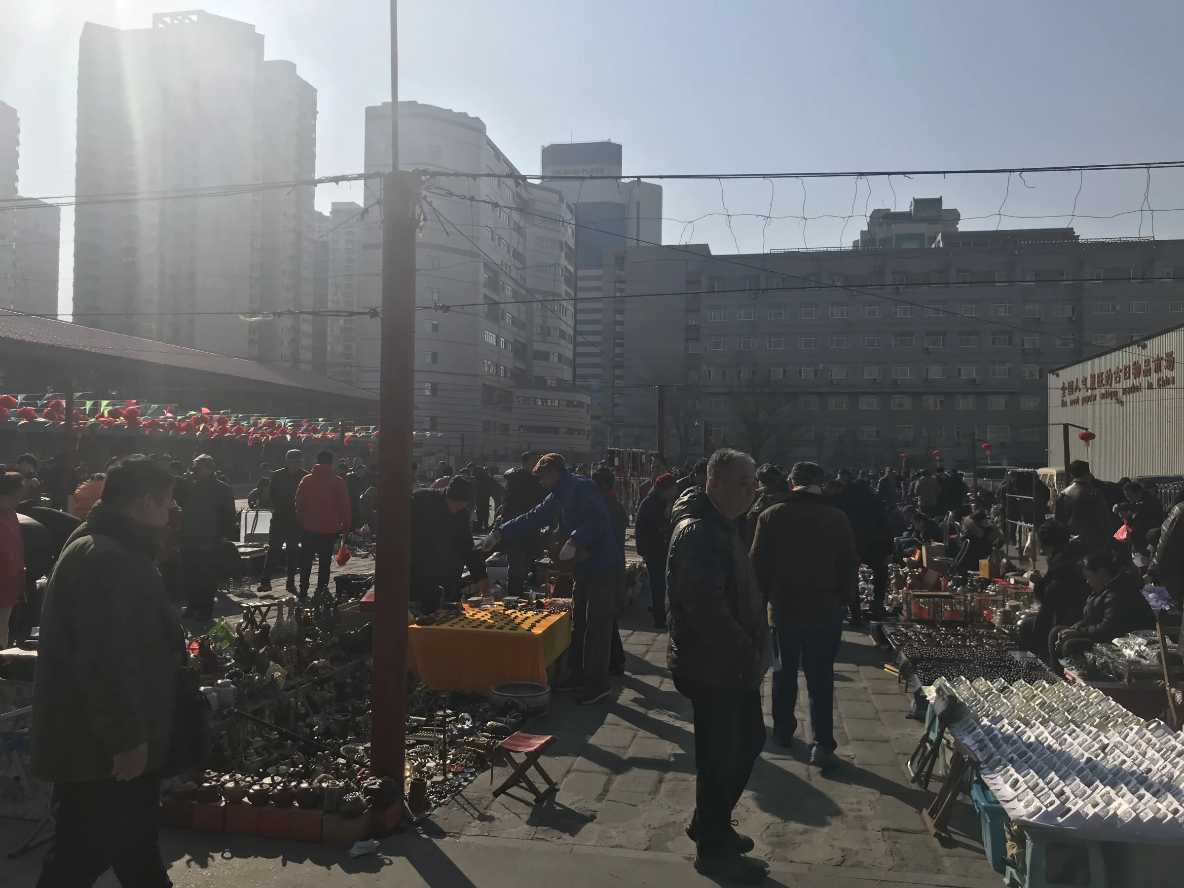 People browsing a local Beijing market