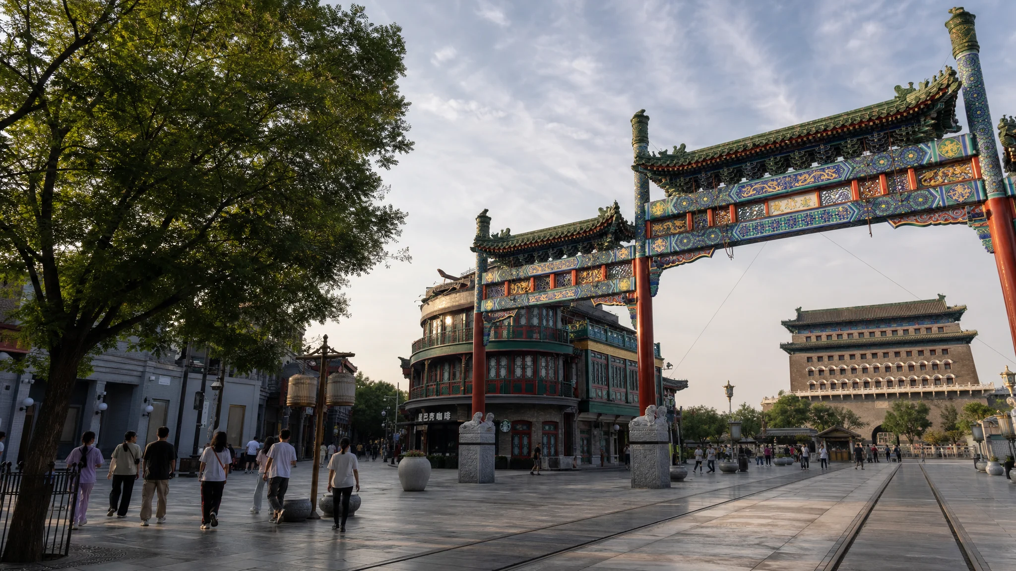 Morning life beneath the historic gateways of Qianmen in Beijing
